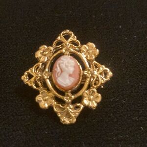 Miniature ornate cameo brooch